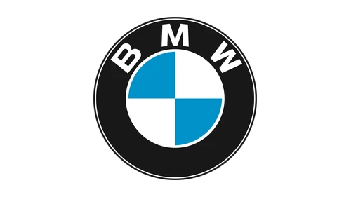 Значок BMW 1960-х годов: плоский роундель с жирными белыми буквами без засечек