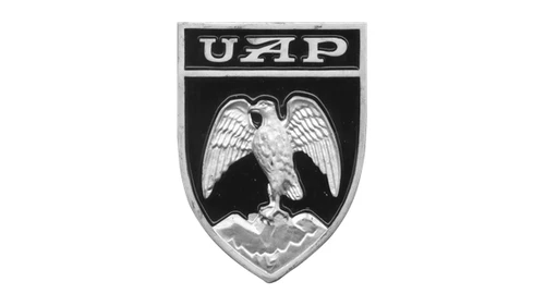 Логотип Dacia около 1978–1990 годов: металлический герб с буквами UAP