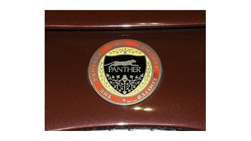 Логотип Panther 1984–1988 годов: круглый значок The Panther Car Company